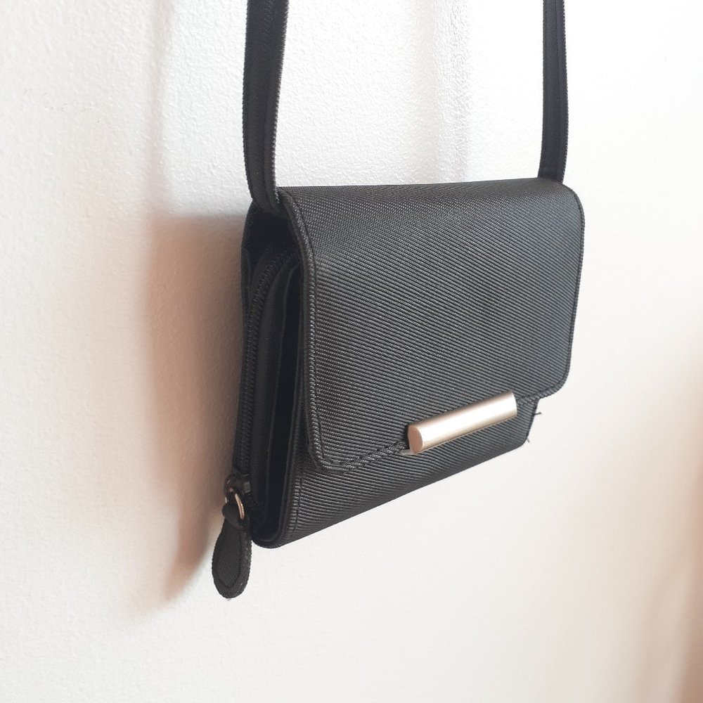 Black wallet bag with shoulder strap